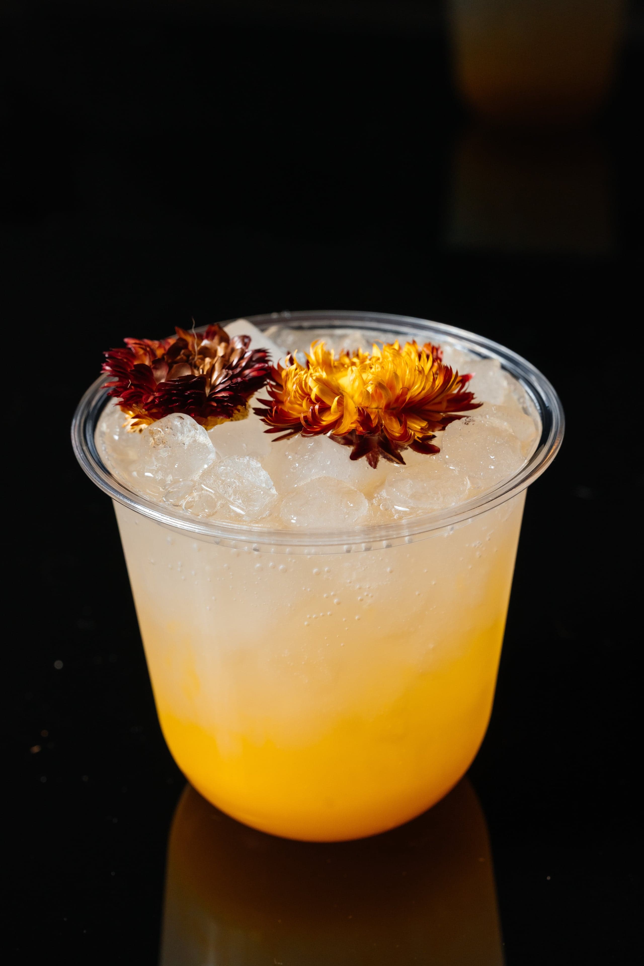 Pineapple Sunrise — Tart lemonade with sweet lavender syrup and a sparkling finish.